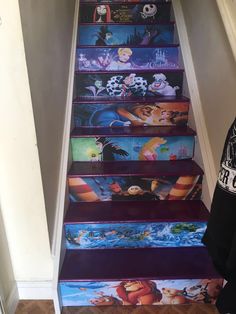 the stairs are painted with disney's characters