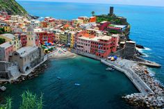 an aerial view of colorful buildings on the water