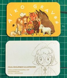 two business cards, one with an image of children's books and the other with animals