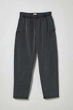 Bonfire full length sweatpants from UO’s own BDG label. Cut from a soft French terry fabrication & available in a range of go-to colors. Relaxed silhouette with straight leg openings and a stretch elastic waistband. Fitted with side and back pockets. Urban Outfitters exclusive. Urban Outfitters exclusive. Features Bonfire full length sweatpants from BDG Soft French terry fabrication Loose leg openings Side & back pockets Elastic waistband UO exclusive Content + Care 80% Cotton, 20% polyester Machine wash Imported Size + Fit Model in Pink is 6’2.5" and wearing size Medium Measurements taken from size Medium Rise: 14" Inseam: 30" Leg opening: 8" | BDG Bonfire Straight Leg Sweatpant in Washed Black, Men's at Urban Outfitters Men’s Lounge, Men’s Sweatpants Fashion, Men’s Sweatpants, Male Clothing Styles, Men’s Pants, Guys Sweatpants, Sweatpants Outfit Men, Clothing Styles For Men, Streetwear Fashion For Men