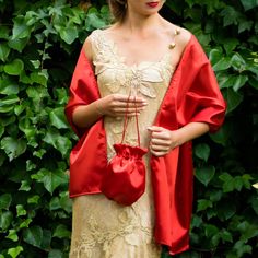 A very elegant satin bag/purse and shawl for your wedding party or evening dress. Made of luxury satin, slightly sparkles on the sun or light. Color: scarlet red ( other colors are available ) Dimensions : shawl170 cm x 40 cm , bag : 20 x 18 cm You can use it as a wrap, shawl or stola. WE have more matching bags in our Etsy Shop! WE accept credit cards! Star Shawl, Faux Fur Wrap, Wedding Shrug, Bolero Wedding, Bridal Bag, Gold Wrap, Satin Bags, Elegant Bags, Wrap Shawl