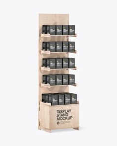 the display case is made out of wood and holds many different types of black containers