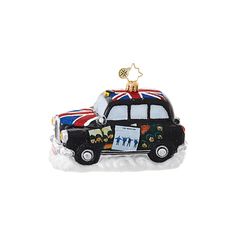 an ornament shaped like a car with the british flag on it