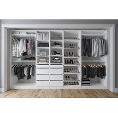 a walk in closet filled with lots of white drawers and clothes on top of shelves