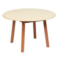 a white table with wooden legs and a round top, on a white background in front of a white backdrop