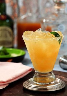 a drink sitting on top of a wooden table