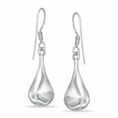 Trendy yet timeless, these modern teardrop earrings are a great look anytime. Fashioned in sterling silver, each dimensional elongated and widened teardrop is finished with a polished shine and suspends from a French wire back. Modern Hypoallergenic Teardrop Jewelry, Sterling Silver Teardrop Earrings With Shiny Finish, Modern Sterling Silver Teardrop Earrings, Modern Sterling Silver Pear-shaped Earrings, Elegant Sterling Silver Teardrop Earrings With Polished Finish, Modern Sterling Silver Pear-shaped Jewelry, Modern Teardrop Earrings With Polished Finish, Modern Pear-shaped Sterling Silver Jewelry, Modern Teardrop Sterling Silver Earrings