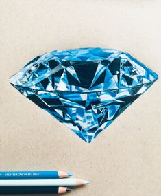 a drawing of a blue diamond with two pencils next to it