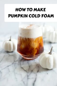 how to make pumpkin cold foam in a glass with mini white pumpkins on the side