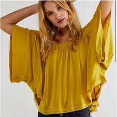 Free People- Sunsetter Linen Blend Top -Nwt Size: Xs Color: Golden Meadow This Breezy Linen-Blend Blouse Is Styled In A Billowy Cropped Fit With Fluttering Sleeves. 19" Length (Size Medium) Square Neck Short Sleeves 55% Linen, 45% Viscose Dry Clean Or Hand Wash, Dry Flat Imported Women's Clothing Item # 6593724 Box 79 Bohemian Style Relaxed Fit Tops, Bohemian Relaxed Fit Top, Summer Batwing Sleeve Tops, Trendy Flowy Tops, Casual Stretch Tops For Brunch, Trendy Batwing Sleeve Top For Summer, Trendy Summer Tops With Batwing Sleeves, Spring Batwing Sleeve Blouse, Spring Day Out Batwing Sleeve Tops