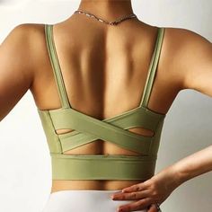 Adella Sports Bra. A comfortable fit with a sporty look for workouts, yoga or just hanging out. Pair with an item from our leggings collection. Detail: Padded/RemovableMaterial: (80%) Nylon, (20%) Spandex Supportive Activewear With Built-in Bra For Pilates, Gym Sports Bra With Built-in Padding And Stretch, Green Sports Bra With Built-in Padding For Pilates, Sports Bra With Built-in Padding For Yoga, High Stretch Yoga Pants With Built-in Bra, Casual Activewear With Built-in Padding And Supportive Fit, Sleeveless Nylon Activewear For Yoga, Fitted Nylon Yoga Pants For Sports, Compressive Go-dry Sports Bra For Pilates