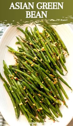 green beans with sesame seeds on a white plate