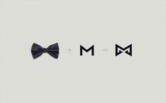 two bow ties that are next to each other on a gray background with the letter m