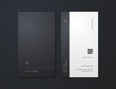 a black and white business card on a dark background