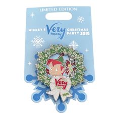 the little mermaid christmas pin is shown in front of a blue card with snowflakes