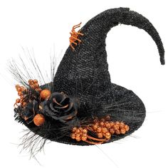 a black witch hat with orange flowers and feathers