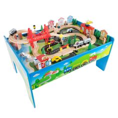 a toy train table with cars and trucks on the top is in front of a white background