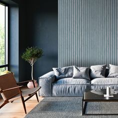 a living room filled with furniture next to a large window and a plant on top of a coffee table