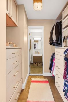 the closet is clean and ready to be used as a dressing room or bedroom area