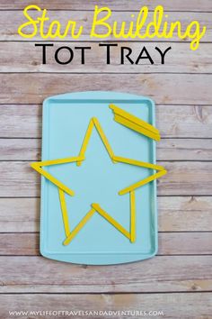 a blue tray with yellow sticks sticking out of it and the words star building to try