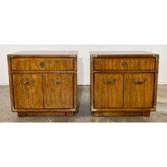 pair of art deco nightstands with brass handles