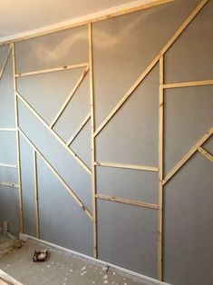 a room that is being remodeled with wood framing on the wall and walls in place