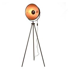 a floor lamp with an orange ball on it's tripod base and black metal legs