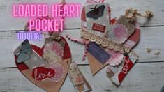 two heart shaped paper pieces with the words loaded heart pocket on them, next to each other