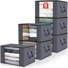 three storage bins with handles for towels, blankets and other items in grey fabric