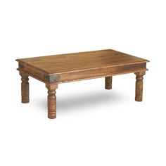 an old wooden coffee table with turned legs