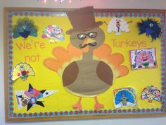 a bulletin board with a turkey wearing a top hat