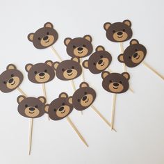 brown bear cupcake toppers on sticks with wooden stick heads in the shape of bears