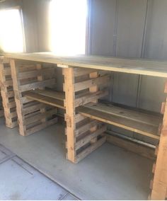 the table is made out of pallets and has been placed on top of it