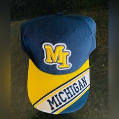 Up For Sale Is One Michigan Wolverines Baseball Cap. One Size Fits All Velcro Adjusting New With Tags. Yellow Sports Trucker Hat With Curved Brim, Yellow Trucker Hat For Sports, Yellow Casual Trucker Hat For Sports, Yellow Cap For Sports Events, Sporty Yellow Baseball Cap For Sports, Yellow Sports Trucker Hat, Yellow Sports Hat With Curved Brim, Yellow Sporty Baseball Cap With Curved Brim, Yellow Snapback Sports Hat