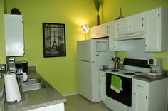 the kitchen is clean and ready for us to use in its new owner's home