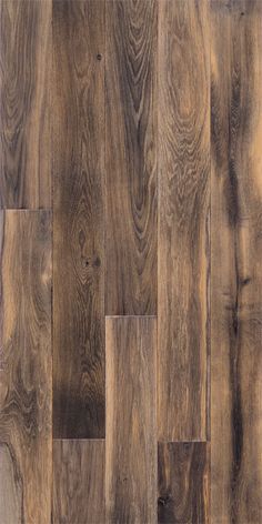 wood flooring that looks like it has been made from different types of boards and planks