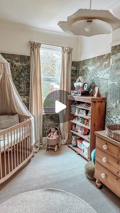 a baby's room with a crib, dresser and bed in the corner