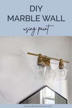 the diy marble wall using paint is an easy and cheap way to update your bathroom