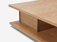 a close up view of a wooden table with perforated panels on the top