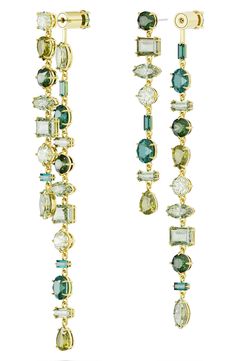 A myriad of crystals streams down the front and back of these asymmetric earrings in gorgeous shades of green. 4" drop; 1/4" width 2 1/2" drop; 1/4" width Crystal/goldtone plate Imported Asymmetric Earrings, Swarovski Crystal Drop Earrings, Front Back Earrings, Swarovski Earrings, Crystal Drop Earrings, Art Deco Interior, Crystal Drop, Earring Backs, Shades Of Green