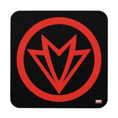 a red and black mouse pad with an arrow in the center