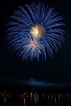 fireworks are lit up in the night sky