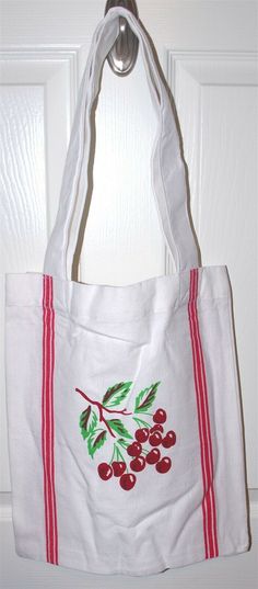 RETRO CHERRIES DESIGN COTTON TOTE BAG - NEW!  This is a Charming Vintage Cherries Design 100% Cotton Shoulder Length Straps Tote Bag from Red and White Kitchen Company.  The Retro Cherries Design decorates both sides of this retro design tote bag.  The shoulder length tote measures 12" x 14"  AND IS NEW, IN MINT  CONDITION!  See the coordinating Cherries Flour Sack Towel available in our Store.      My Policies: We accept Visa/Mastercard/Discover Card/American Express/Debit Cards through eBay Ma Retro Red Cotton Bag, Vintage White Cotton Shoulder Bag, Vintage Canvas Tote Bag For School, Vintage White Tote Shoulder Bag, Vintage White Canvas Bag For Everyday Use, Vintage White Bag For Errands, Vintage White Gift Bag, Retro White Canvas Bag For Everyday Use, White Retro Tote Canvas Bag