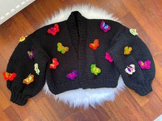 Knit Chunky Butterfly Cardigan, Gothic Black Butterfly Cardigan, Kawaii Butterfly Sweater, Cardigan for women, Floral Cottage core Cardigan, Knitwear for women Hey! 💖 everyone welcome to our unique store! I'm creating and my mom is knitting as a team! I'm in love with Kawaii and Cottagecore style. My mom is also knitting for 30 years and she is a professional knitter. Our designs are rare to find and suitable for everybody. And we are using the best yarns in the world! 🌎 This product will keep Cottage Core Cardigan, Kawaii Butterfly, Women Cottagecore, Butterfly Cardigan, Butterfly Jacket, Butterfly Sweater, Cottagecore Clothes, Floral Cottage, Cardigan For Women