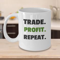 a white coffee mug that says trade profits repeat