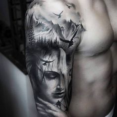 a man's half - sleeved tattoo with an image of a woman and birds