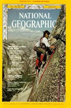 the cover of national geographic magazine, featuring a man climbing up a mountain