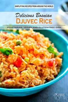 a blue bowl filled with rice and vegetables