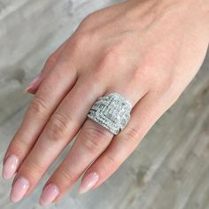 a woman's hand with a ring on it