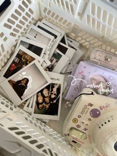 a basket filled with pictures and other items